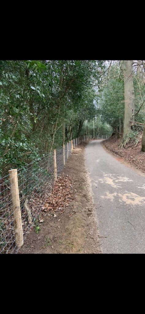 This is a photo of stock fencing installed along the side of a country road. By Fast Fix Fencing Longstanton